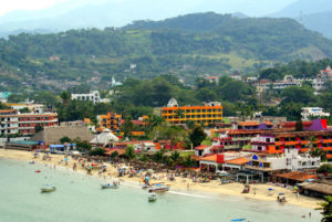 Rincon de Guayabitos is the quintessential resort town, with a long sandy three kilometer beach, perfect for walking, swimming, and water sports. © Christina Stobbs, 2012