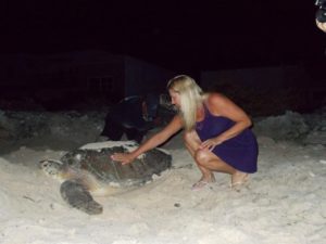 Yes, you can participate in this miracle of nature, volunteering to work with endangered sea turtles on Isla Mujeres © Louie Frias, 2013