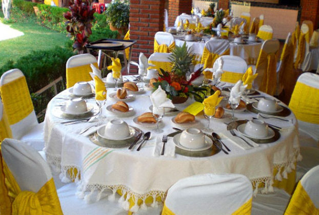 The tables are set and ready for guests. Custom centerpieces and place settings can be arranged in Oaxaca salones para eventos. © Alvin Starkman 2008