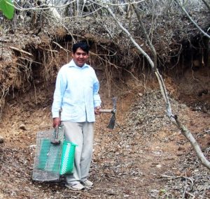 Martín Navarro with pick and sledgehammer, ready to mine clay. © John Pint, 2012