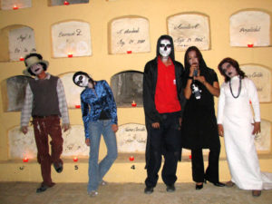 This group of creatively dressed young people was eager to pose for cameras in front of the crypts that line the corridor of El Panteón in Oaxaca city.