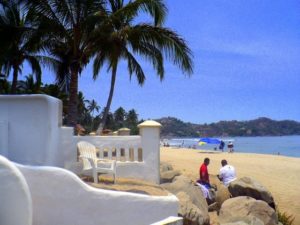 Sayulita beach is stunningly beautiful. The two-mile long beach on Mexico's Pacific coast boasts soft fine sand, warm blue waters and perfect surfing waves. © Christina Stobbs, 2009