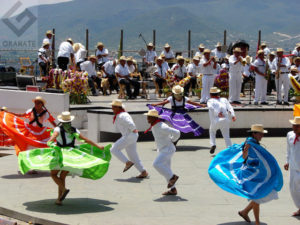 Dancers from Ejutla in huaraches and cowboy hats. This is part of the annual Guelaguetza festivities in Oaxaca, held the last two Mondays of July. © Oscar Encines, 2008