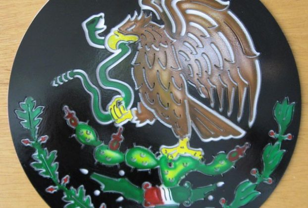 The national seal of Mexico cut of iron and painted by a local Chapala tattoo artist © Marvin West, 2013