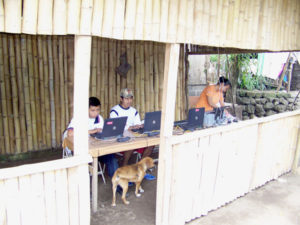 The local internet cafe, in an open-air bamboo building