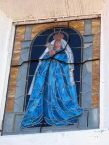 The lovely stained glass Virgin window in Tetelpa's San Esteban Church. © Julia Taylor, 2008