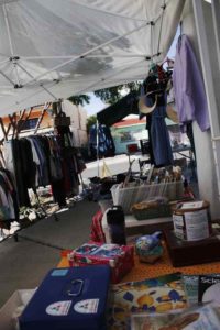 Frequently, volunteers hold yard sales, which help raise money to feed hungry families, put kids through school, or provide medical assistance © Mariah Baumgartle, 2012