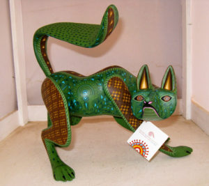 A lithe green cat wears Jacobo Angeles' signature tag. The master artisan is a native of Oaxaca. © Alvin Starkman 2008