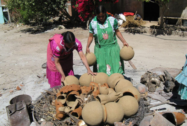 The women of San Marcos Tlapazola, Oaxaca, shape their clay pottery by hand. © Alvin Starkman, 2010