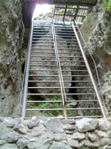 At the end of the exhausting climb you find this ladder with metal grating at the top that locks the site.