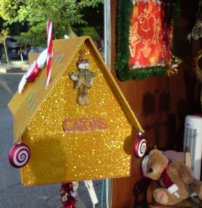 This glittering mailbox in a Mexico plaza is ready to reaceive cartas, or letters for Santa Claus or for the Niño Dios (baby Jesus). © Daniel Wheeler 2009