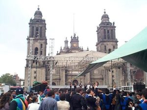 Looking north at the cathedral there is a stage erected with a popular band playing.