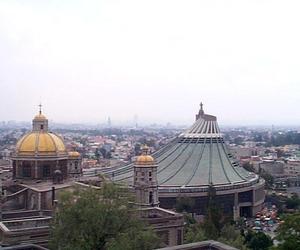 The New Basilica of the Virgin of Guadalupe (right) and the Old Basilica with its gold domes (left). © Rick Meyer, 2001