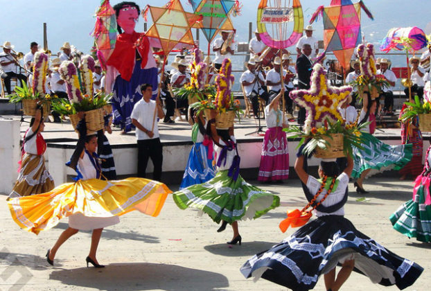 Chinas or "Chinese Girls" from Oaxaca's central valleys whirl to the music of a local folkloric orchestra.This is part of Oaxaca's annual Guelaguetza festivities held the last two Mondays of July.   © Oscar Encines, 2008