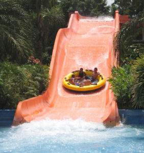 Four friends enjoy a ride together at El Rollo, the largest waterpark in Latin America. © Julia Taylor, 2008