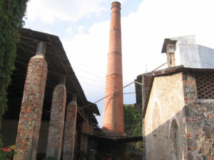 The chimney still stands and reminds the visitor that this was once a Mexican sugar producing plant. © Julia Taylor 2008