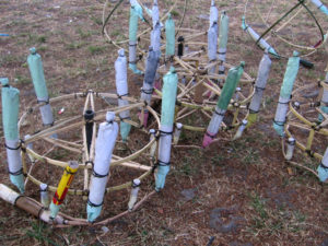 Detail of the hand-packed fireworks mounted on spinning wheels that will fly off of the castillo. © Julia Taylor, 2007