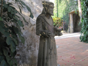 A bird alights on the hand of Saint Francis, the gentle saint whose brotherhood included all creation. In one story, he preached to hundreds of birds telling them to be thankful to God for their wonderful clothes, for their independence, and for God's care. The birds stood still as he walked among them, flying off only when he said they could leave. © Julia Taylor 2008