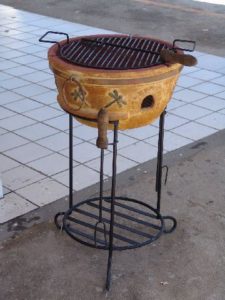 Ceramic charcoal grill