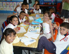 Happy children in their San Quintin, Mexico classroom © Edd Bissell, 2010