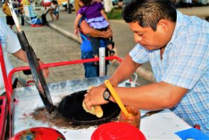 A street vendor makes marquesitas, rolled sweets stuffed with Nutella, cajeta or gouda cheese or a combination of all. © 2020 Jane Simon Ammeson